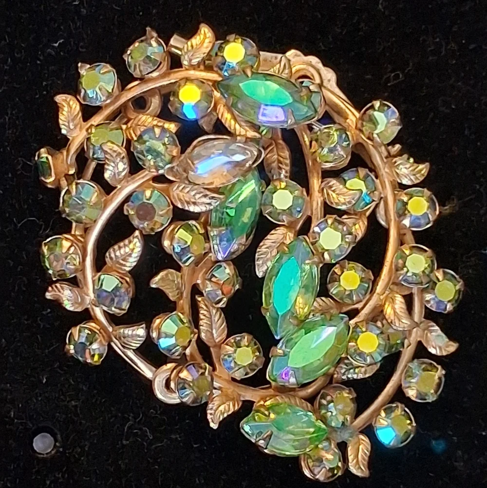Goldtone Vines And Leaves Brooch With Green And Ab Rhinestones